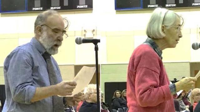 Mark Raines and Diane Oltarzewski at the microphone