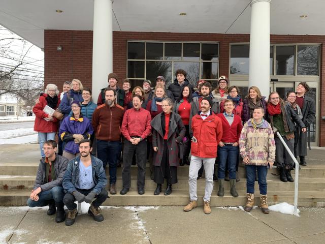 A group of people at their court arraignment