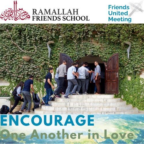 Students walk up steps to enter a vine-covered school