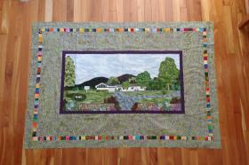 Photo of quilt picturing the Mt Toby meetinghouse