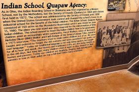A photograph of a museum sign about Indian Schools founded by Quakers